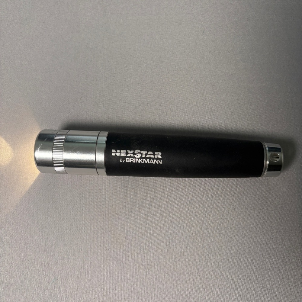 Brinkmann Nexstar Flashlight Black Silver Rubber Grip Handheld Portable Light